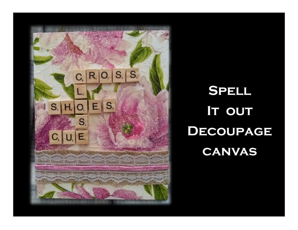 A floral decoupage canvas decorated with Scrabble tiles spelling the words "CROSS," "CLOSE," "SHOES," and "CUE," with lace and ribbon accents. The text on the side reads "Spell It Out Decoupage canvas."
